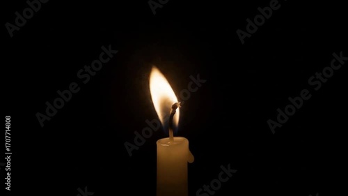A burning candle on a green screen background,  Single White Candle Flame on Green Screen,
Warm candle flame flickering gently against vibrant green screen. Closeup of a burning candle flame against.