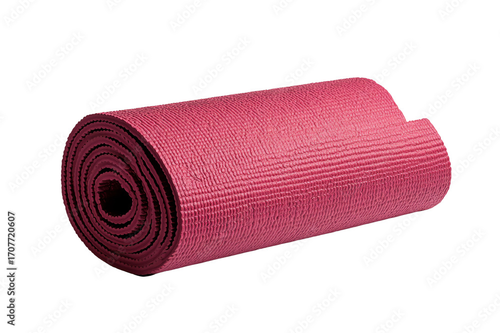 Obraz premium A rolled pink yoga mat on a white isolated background.