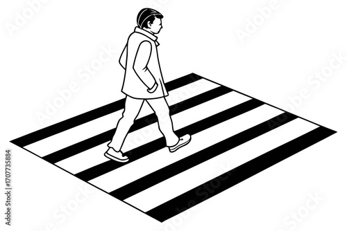 Man walking across a pedestrian crossing.