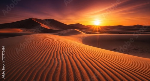Fototapeta Naklejka Na Ścianę i Meble -  Desert dunes with sunset, waves of sand lit by golden light, creating a warm, tranquil scene