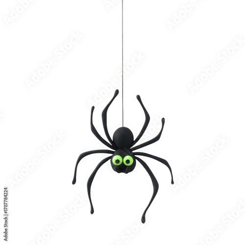 Cartoon black spider with bright green eyes hanging on a thin thread isolated on transparent background