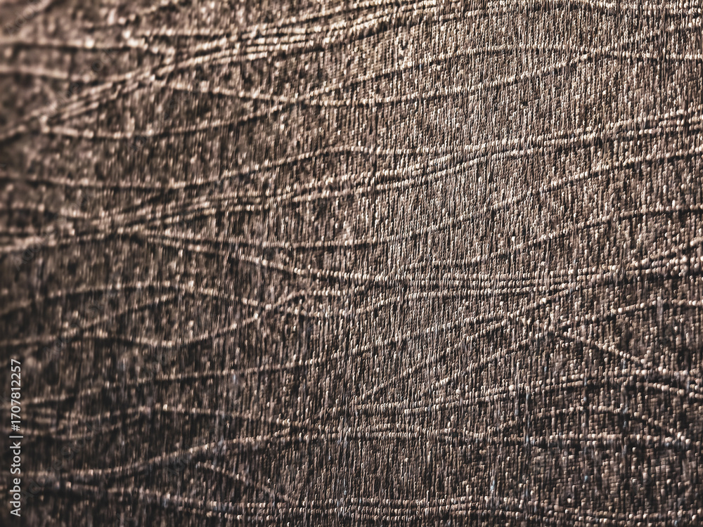 Fototapeta premium Textured Surface: A detailed shot of a unique, abstract surface, perfect for texture enthusiasts and designers, evoking depth and visual interest.