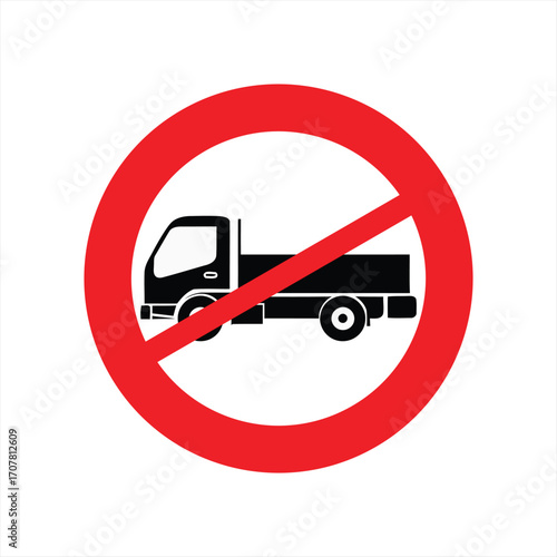 No trucks allowed traffic sign, a black lorry silhouette inside a red prohibition circle, isolated on a white background.