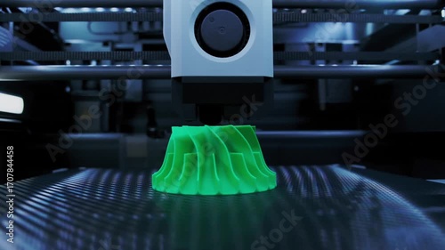 Distant View of 3D Printing Process of a Green Vase With Detailed Mechanics and Vibrant Colors Visible in the Printer