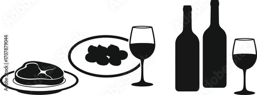 Elegant meal with wine and steak, perfect for a sophisticated dinner or celebration.
