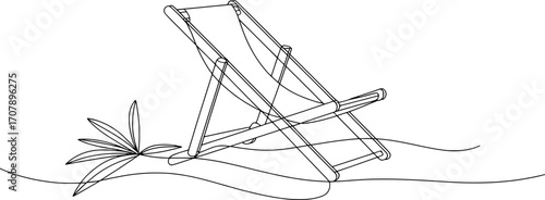 Minimalist beach chair and palm leaf on sand lounge chair deck chair