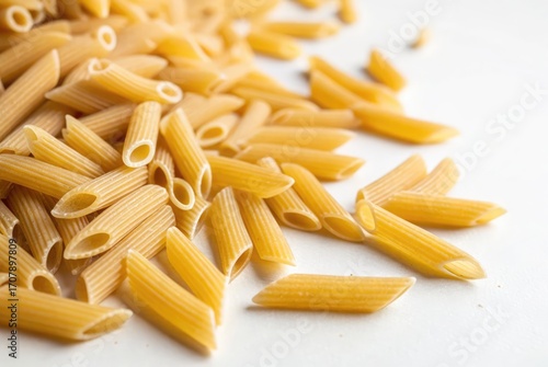 raw pasta on white background