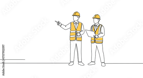 construction workers discussing project plans on site