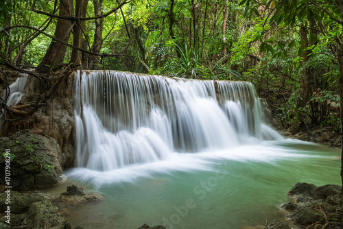 Serene waterfall in tropical jungle at Huay Mae Khamin National Park, Kanchanaburi, Thailand