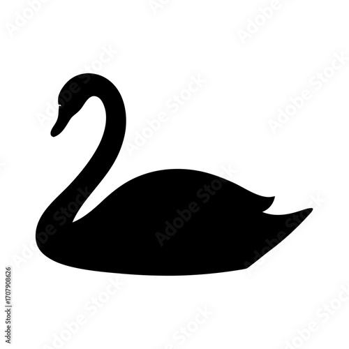 Elegant black silhouette of a graceful swan gliding peacefully on water