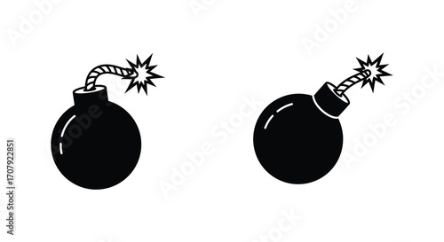 two cartoon bombs with lit fuses sparking