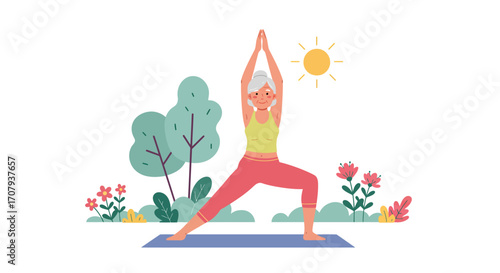 An elderly woman with grey hair practicing yoga outdoors in a park on a sunny day, holding a warrior pose on a blue mat.