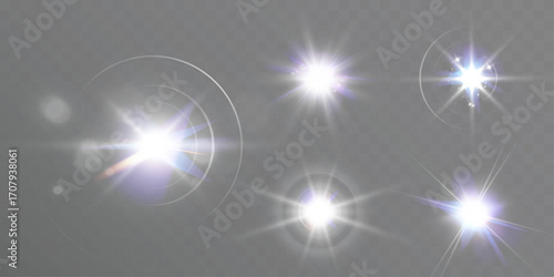 Realistic glowing lens flare set isolated on transparent background.	
