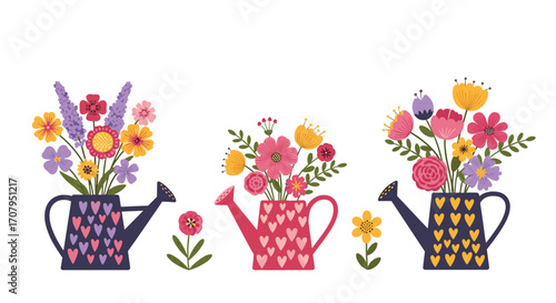 Three Watering Cans Filled With Colorful Spring Flowers.