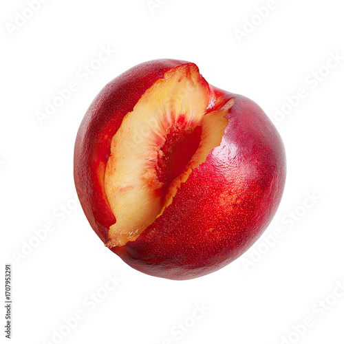 Close-up of a red plum, bitten into, displaying juicy interior