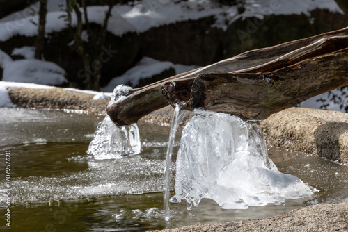 medicinal spring water in a winter temple