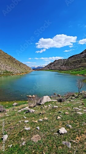 Seasonal wetland nestled among rocky hills and green flora, reflecting the sky's peace and the harmony of untouched nature. 📍Sarpir, Hawraman Takht