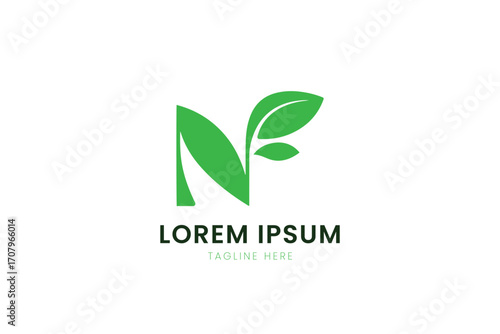 Minimalist green leaf logo design represents nature and growth on a clean background