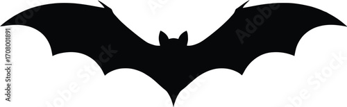 Silhouette of a flying bat with wings spread wide vector