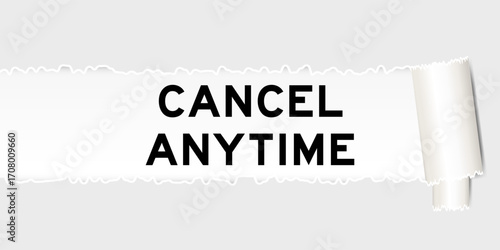 Ripped gray paper background that have word cancel anytime under torn part