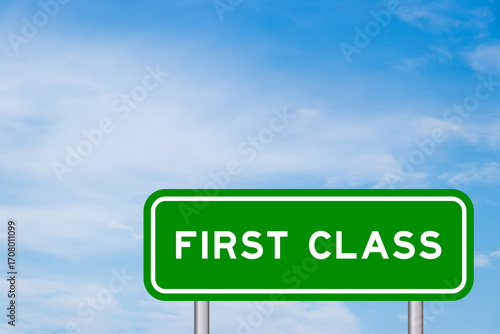 Green color transportation sign with word first class on blue sky with white cloud background