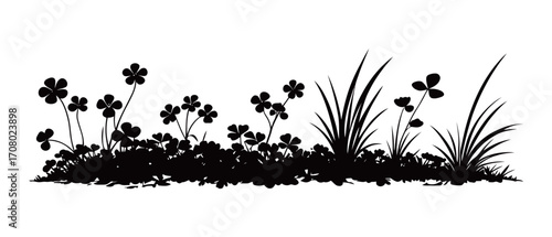 A black and white vector silhouette of a ground cover with clovers and grass, creating a natural and decorative border or background, perfect for a variety of designs.