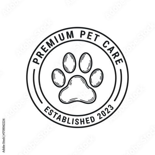 A circular emblem featuring a hand-drawn paw print, symbolizing premium pet care services established in.