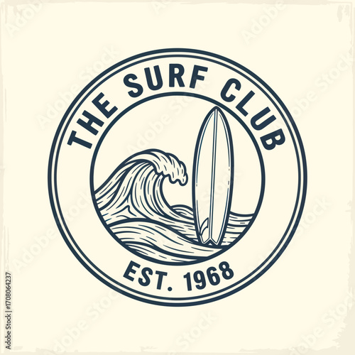 A vintage circular emblem featuring a surfboard standing tall against a cresting ocean wave, with "The Surf Club Est. 1968" inscribed around the border.