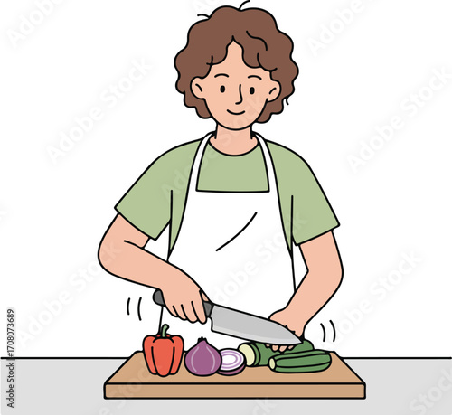 A person with brown, curly hair is shown from the waist up, wearing a light green shirt and a white apron. They are using a large knife to chop vegetables on a cutting board, including a red bell pepp