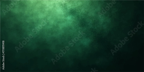 Dark and stormy green grunge chalkboard with a subtle textured pattern of smoke and light
