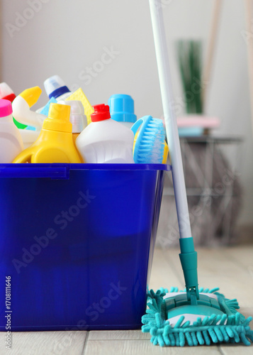 Wallpaper Mural cleaning products in the interior of the room.. Vertical photo format Torontodigital.ca