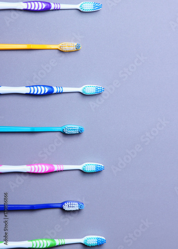 Wallpaper Mural Toothbrushes on a colored background top view. Oral hygiene. Vertical photo format Torontodigital.ca