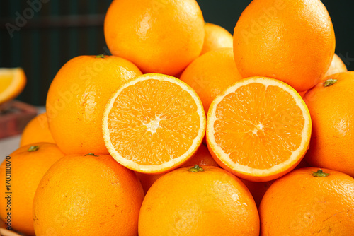 Fresh Sweet Navel Oranges from Holland with Cut Halves Showing Citrus Segments