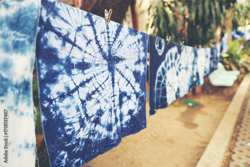 Handmade Indigo Tie-Dye Fabrics. Artisanal Tie-Dye Cloth Drying in the Sun. Natural Indigo Dyeing Process