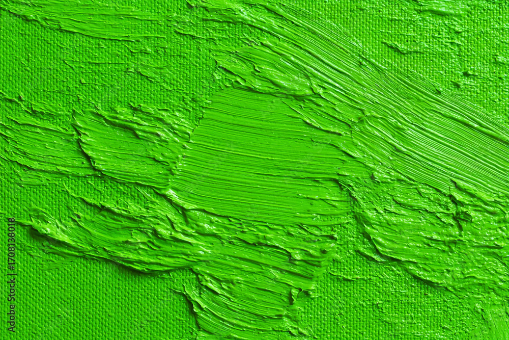Fototapeta premium Vibrant green paint texture thick strokes on canvas artistic background
