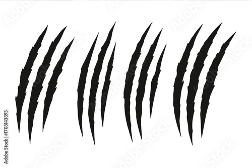 Set of black claw scratches. Wild animal paw marks from tiger, bear, or lion. Monster, dinosaur, or werewolf attack trace. Slashed, ripped, and torn surface damage effect.