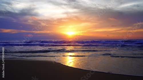 Beautiful sea sunrise or sunset sky over sea,Amazing sky and shining golden waves landscape,Beautiful waves crashing on sandy shore,Beach Sea sky nature background