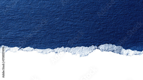 Ripped deep blue paper edge against black