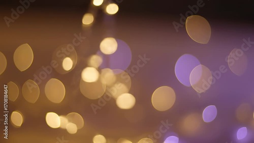 Abstract motion of soft focus bokeh lights, creating a serene, peaceful background, seamlessly looping light, tranquil, design