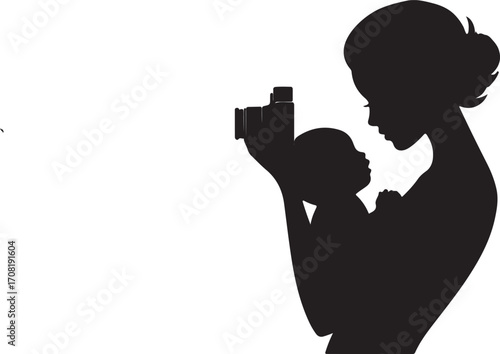 Mother holding baby and taking photo silhouette.