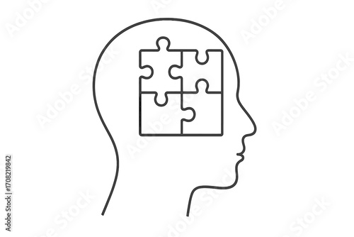 Puzzle pieces in head silhouette. Concept of mental health, psychology, logic, and order. Mind, thoughts, and problem-solving. Metaphor for autism or neurodiversity.