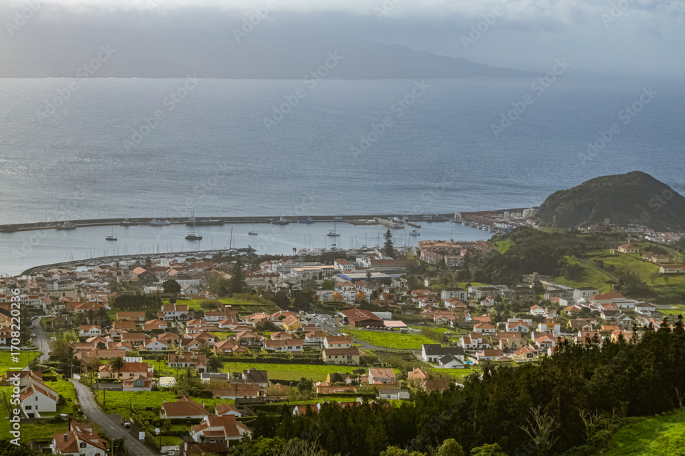 Obraz premium Breathtaking viewpoint of the coastal houses at Faial island Azores Portugal