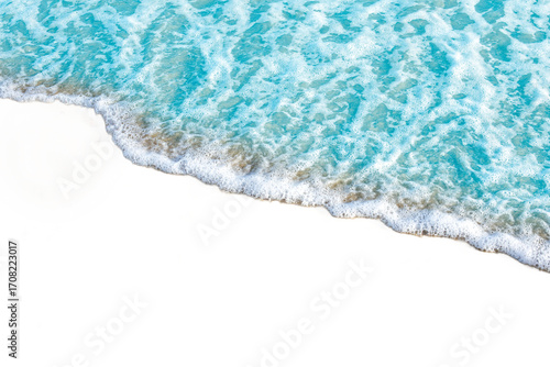 Waves gently crashing on sandy beach, creating soothing and peaceful scene