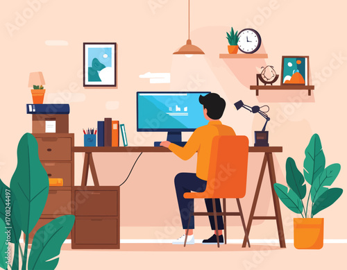 Man working on computer at home office desk.