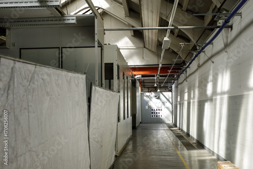 Sunlit industrial hallway, ...