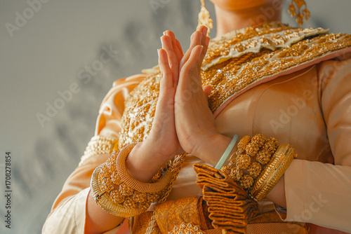 Wallpaper Mural Khmer apsara traditional dance performer hand gesture at a pagoda in Tra Vinh province, Vietnam Torontodigital.ca