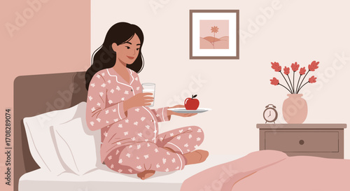 Pregnant woman relaxing in bed with apple and glass of milk  