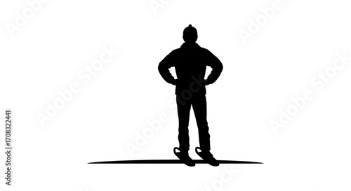 Confident person stands ready for winter adventure wearing snowshoes and warm clothing