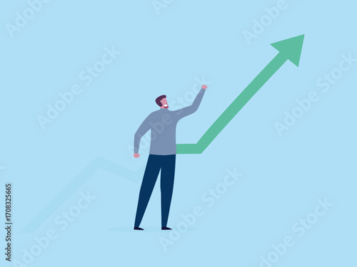 Man reaching for a green upward trending arrow symbolizing growth and success