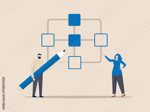 Two people collaborating to build a flowchart or organizational chart using a large pencil and pointing